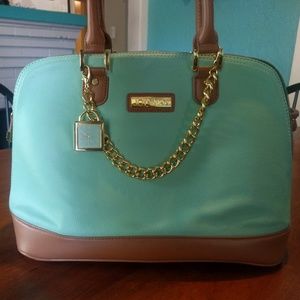 Joy Iman mint green bag and wrist wallet